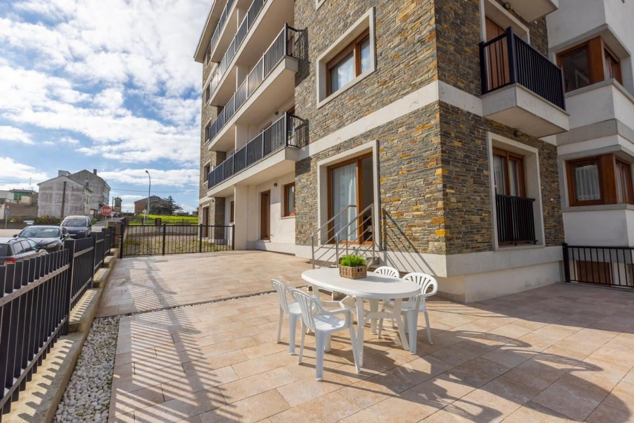 Apartamentos Playa de LLAS Foz Exterior foto