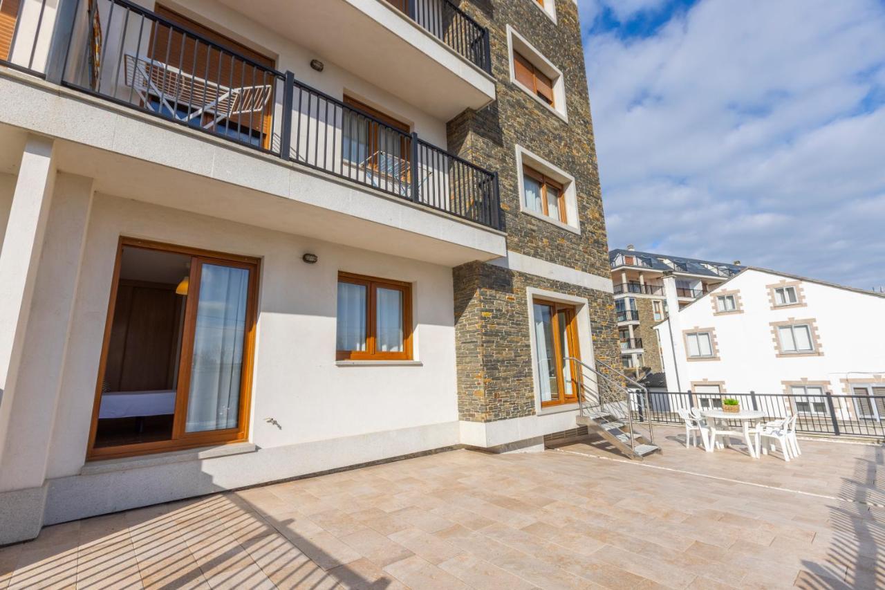 Apartamentos Playa de LLAS Foz Exterior foto